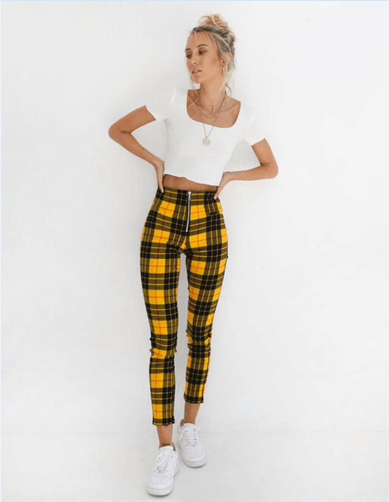yellow and black plaid women’s high-waist stretch leggings with a front zipper detail