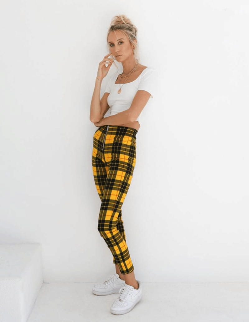 yellow and black plaid women’s high-waist stretch leggings featuring a tapered fit and high-waist design in a 3 pack set