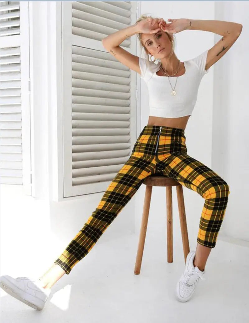 yellow and black plaid women’s high-waist stretch leggings with a front zipper detail