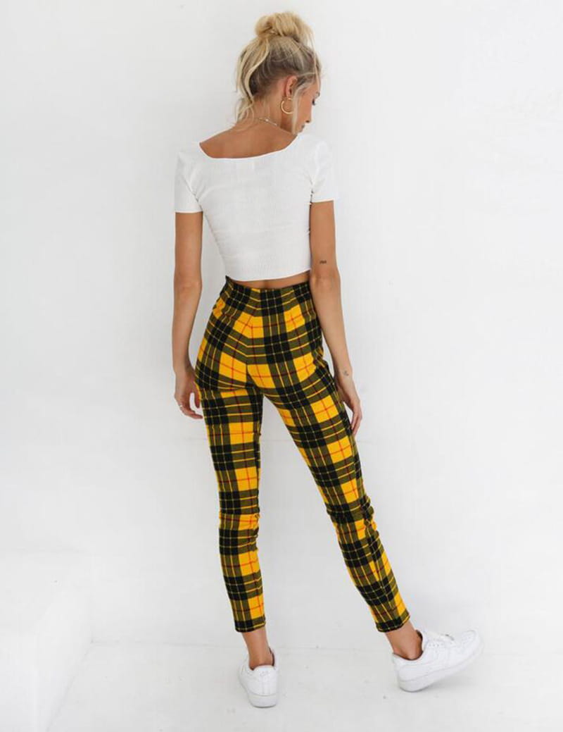 yellow and black plaid women’s high-waist stretch leggings featuring a high-waist design and elastic material for comfortable wear