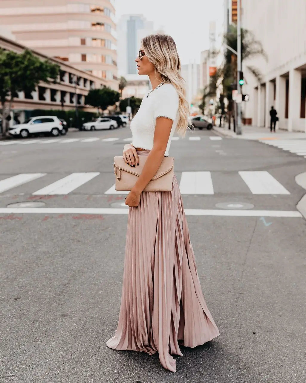 Beige pleated maxi skirt with skirt length flowing to the floor designed for women fashion casual wear.