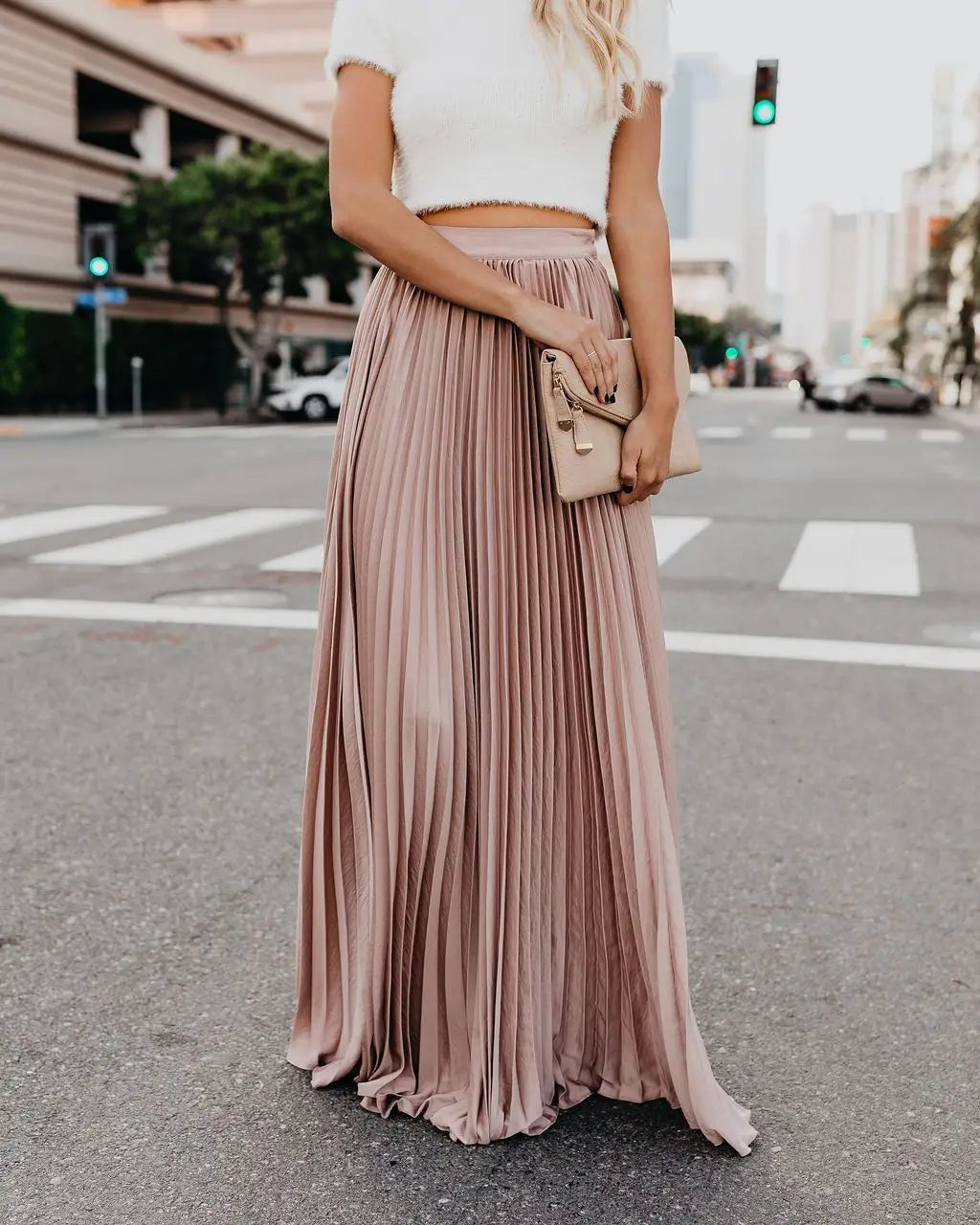 a flowing dusty rose pleated maxi skirt with a soft lightweight fabric featuring a high waist design for women fashion casual wear and skirt length versatility