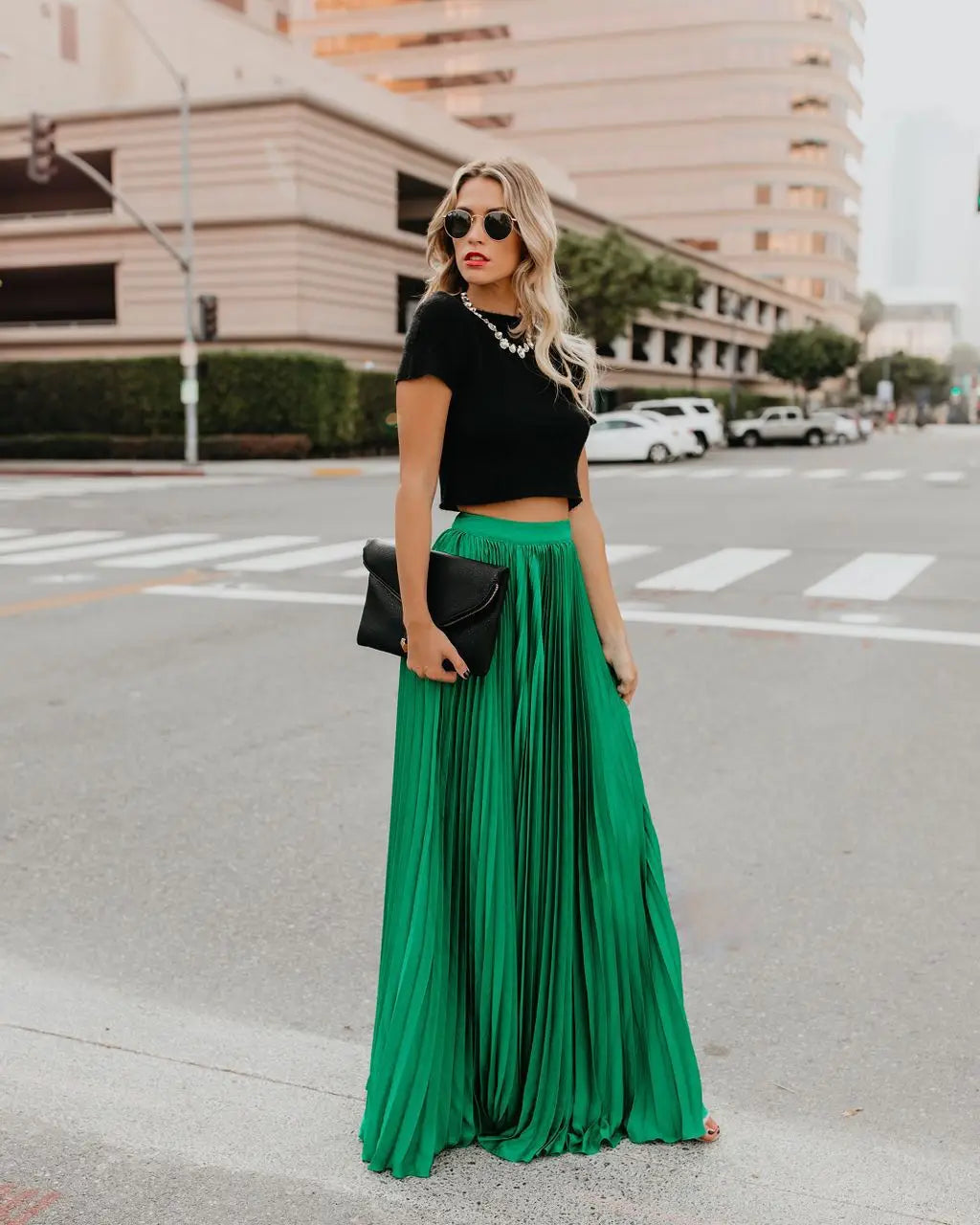 emerald green pleated maxi skirt showcasing skirt length and elegant design for women fashion casual wear.