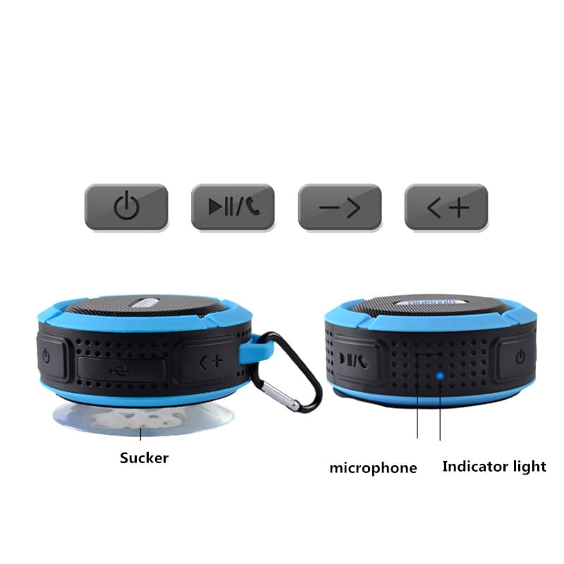 Teal and black portable waterproof speaker with carabiner clip designed for outdoor use and enhanced durability.