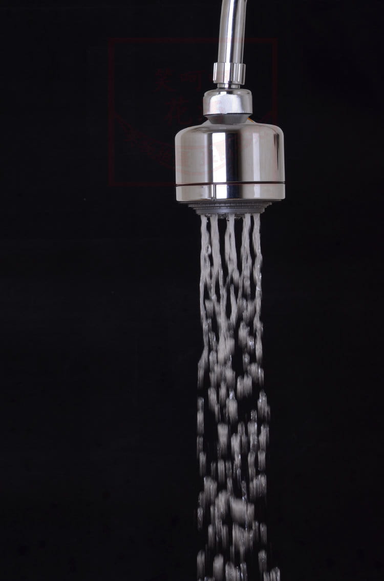Chrome plastic small shower head in stainless steel with a sleek cylindrical design and multiple water jets for an effective spray plastic small shower experience.