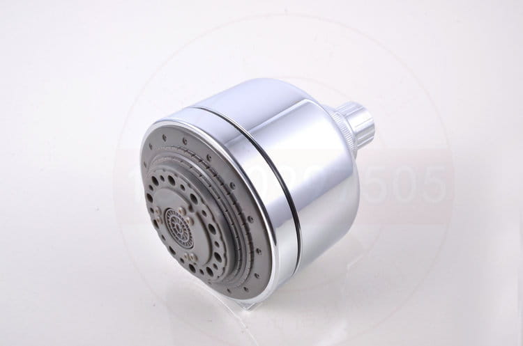 Chrome plastic small shower head with a sleek cylindrical design and multiple spray nozzles for efficient water flow.