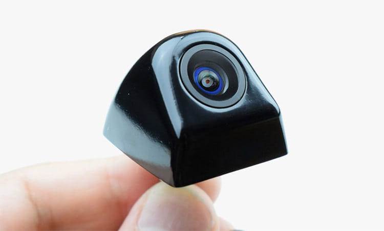 Black glossy plastic rearview camera with circular lens and blue and silver accents for 4.3 inch led rear view mirror with reversing camera.