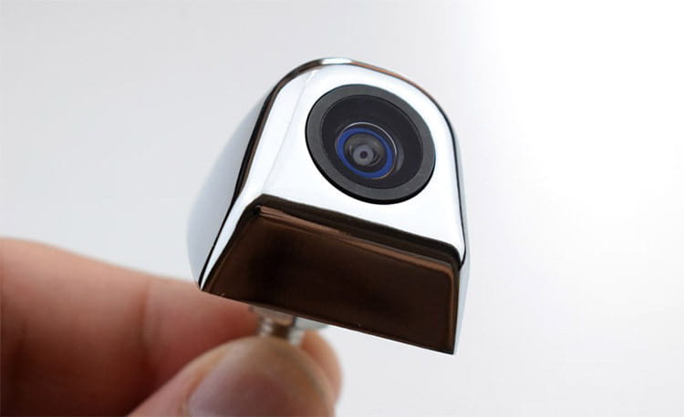 handheld shiny chrome-finished rear view camera with black lens ring and blue-tinted glass designed for 4.3 inch led rear view mirror with reversing camera system.