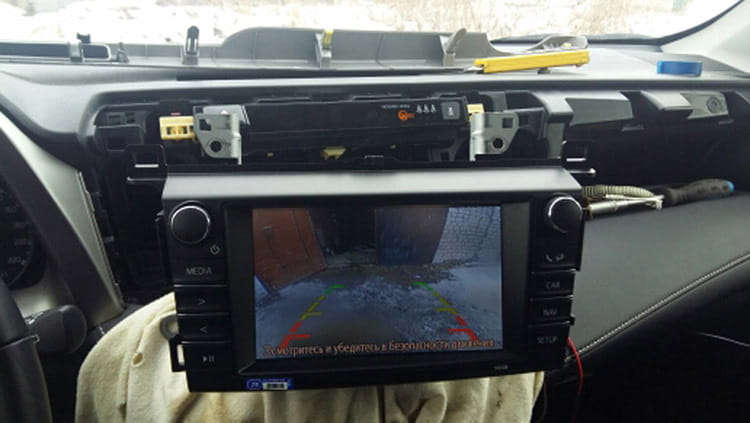 Black 4.3 inch led rear view mirror with a touchscreen infotainment system displaying the rearview camera feed and physical buttons on either side.