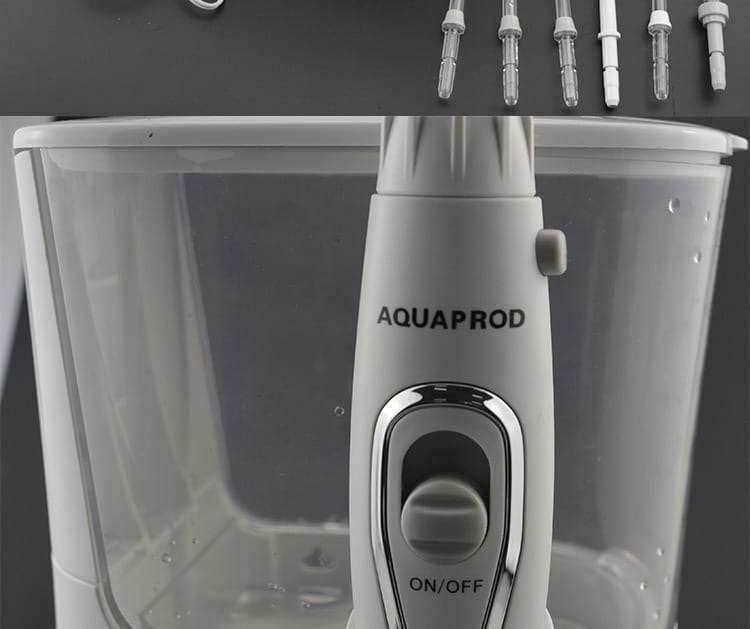 Modern electric tooth punch water flosser in white with a clear tank and chrome accented on off switch featuring a brush head for effective oral hygiene.