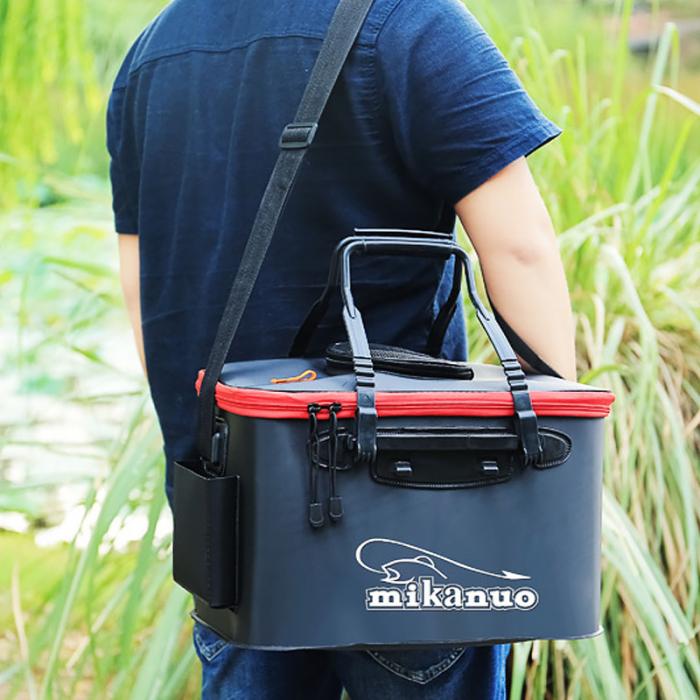 Black and red eva portable fishing bag with reinforced handles and a white logo on the side.