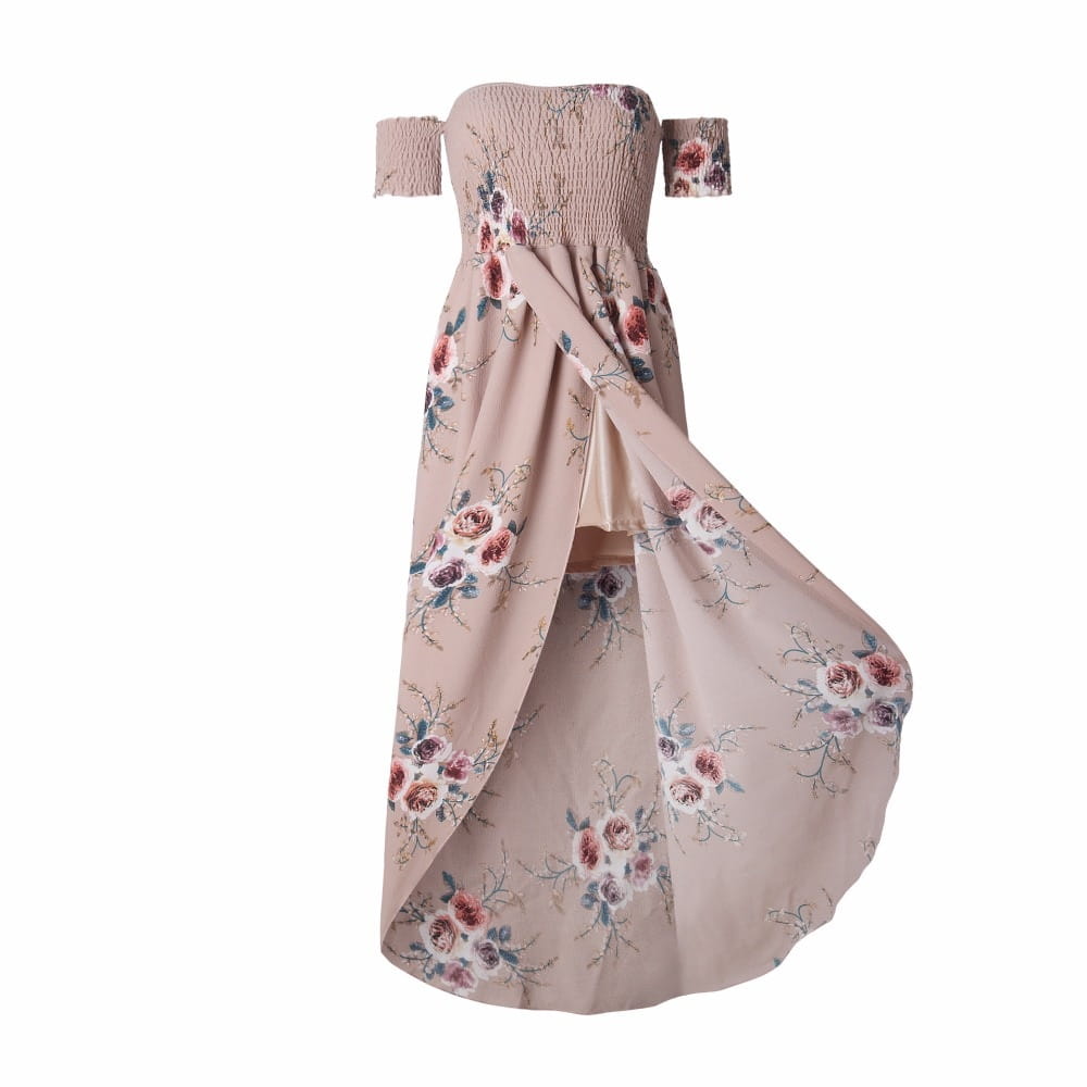 a soft beige boho style long dress women featuring an off-the-shoulder design with a smocked bodice and floral pattern in muted pinks purple and greens