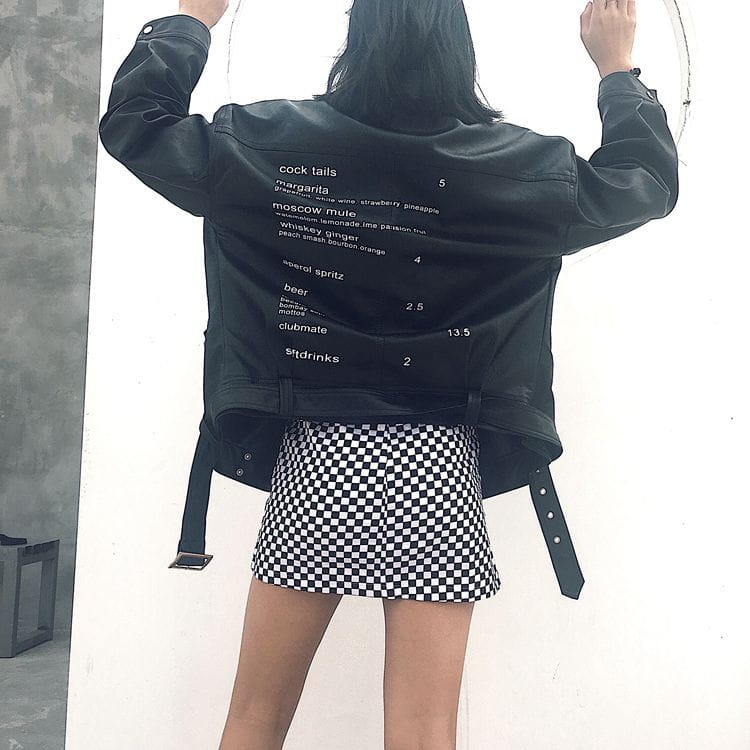 a black leather jacket with a printed cocktail drink menu on the back featured in the checkered mini skirt variable mso-font-signature collection highlighting mso-font-pitch variable and variable mso-font-signature design elements