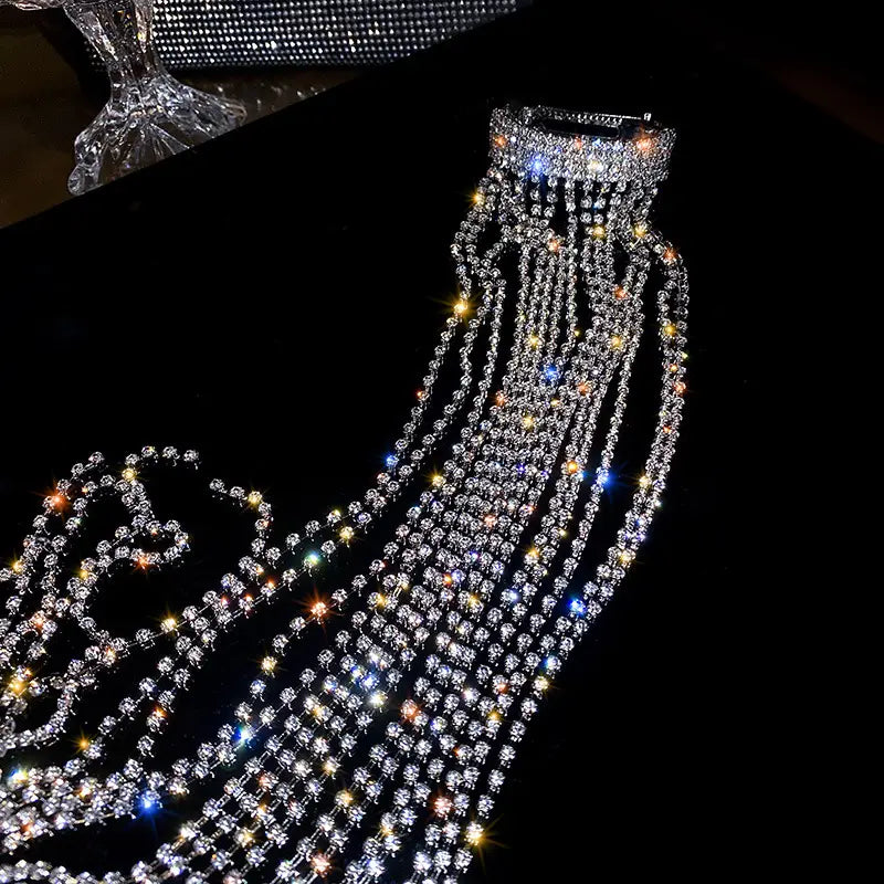 A dazzling silver long tassel rhinestone hair accessory featuring a multi-strand crystal choker with cascading clear and rainbow sparkling rhinestones, ideal for women bijoux long style.