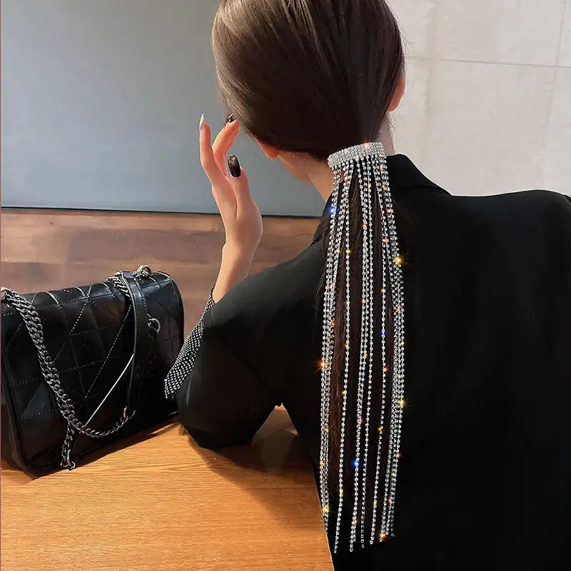 A sparkling silver beaded long tassel hair accessory with cascading rhinestone strands designed for women bijoux long style.