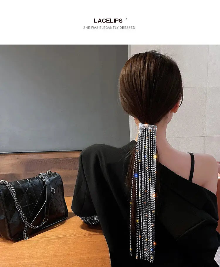 a silver long tassel hair accessory featuring sparkling rhinestones and cascading strands of glittering crystals for women bijoux long style.