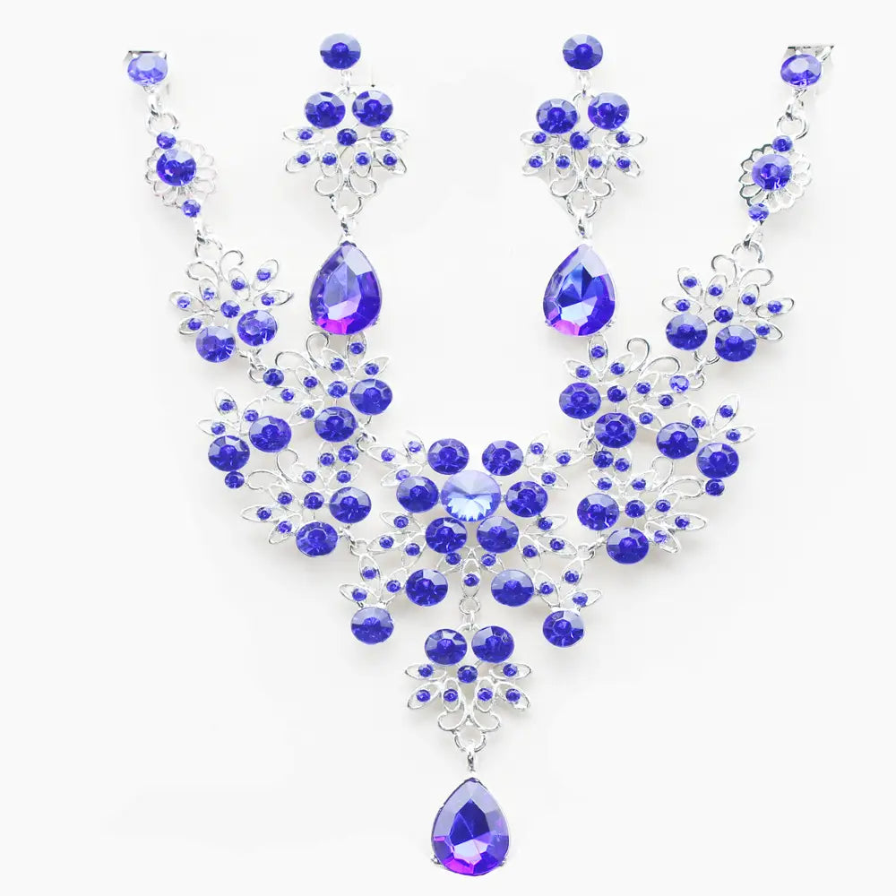 Elegant royal blue big water drop crystal necklace and matching earring set featuring silver-toned floral metalwork in the butterfly big water design.