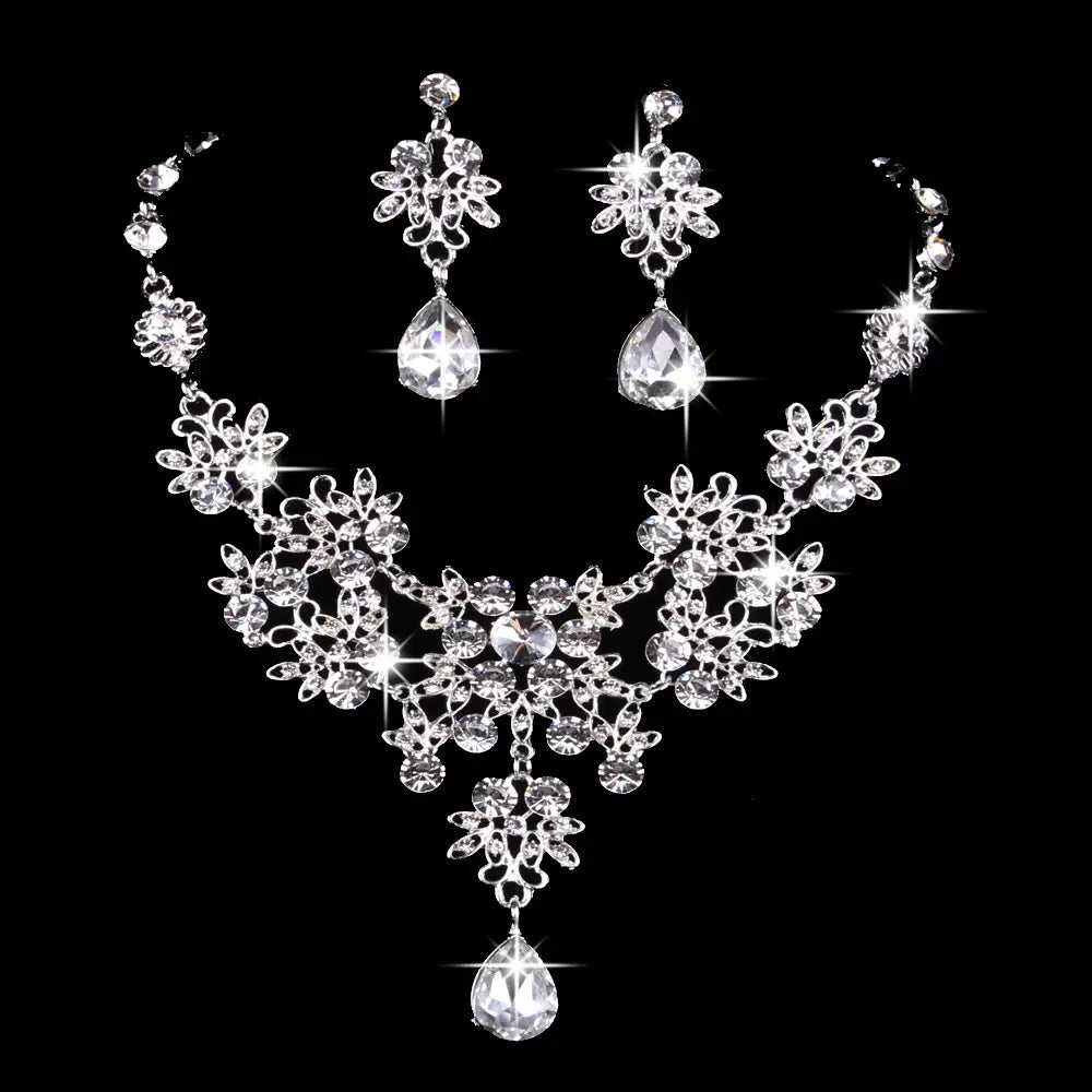 a sparkling silver butterfly big water drop crystal necklace and earring set featuring intricate floral designs with dangling teardrop-shaped crystals