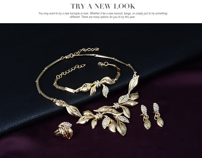 Gold leaf crystal bridal wedding jewelry set featuring gold-toned leaf design and sparkling crystal accents ideal for bridal wedding occasions.