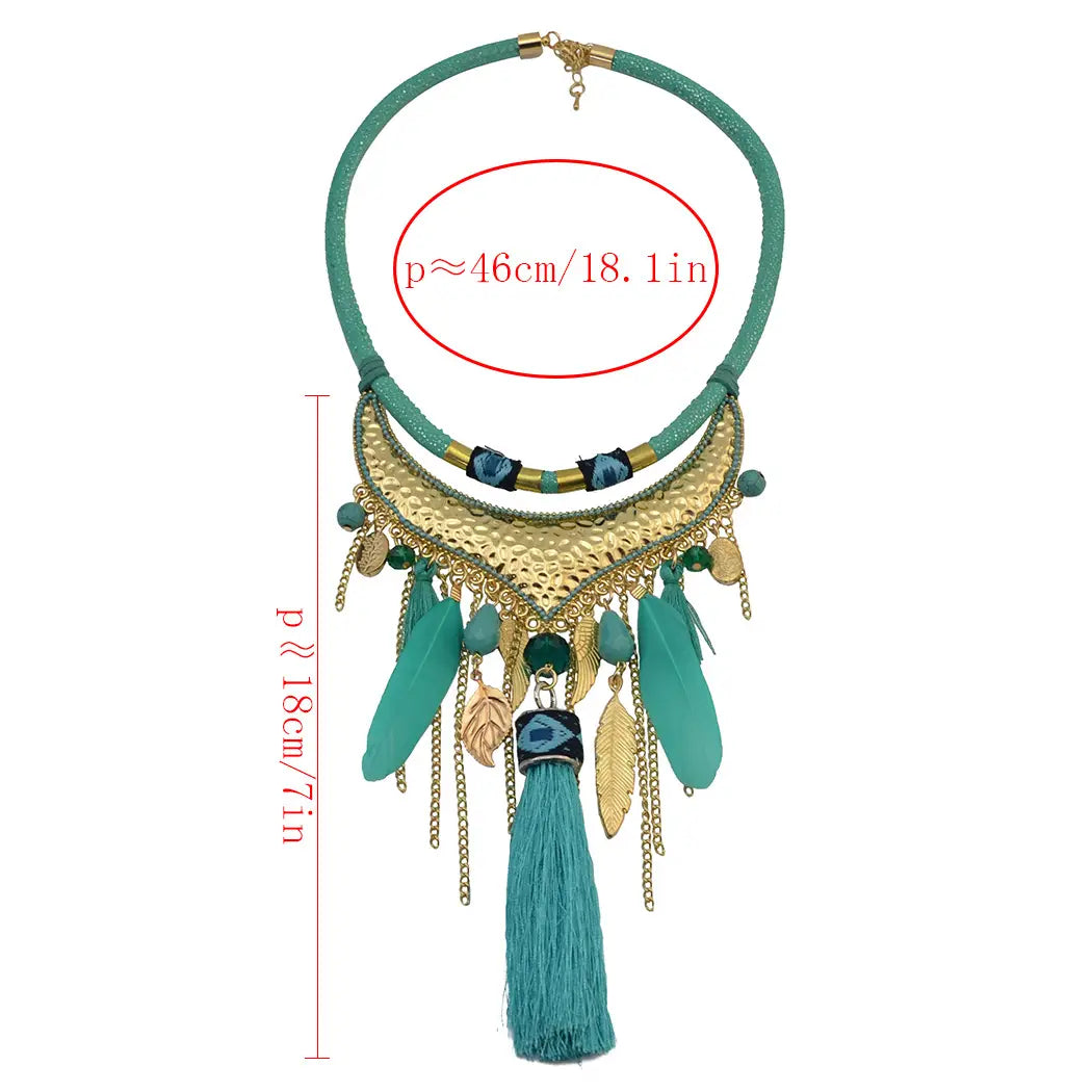 teal and gold bohemian-style statement necklace featuring layered textures with dangling original jewelry feather leaf, beads, chains, and a prominent feather leaf tassel.