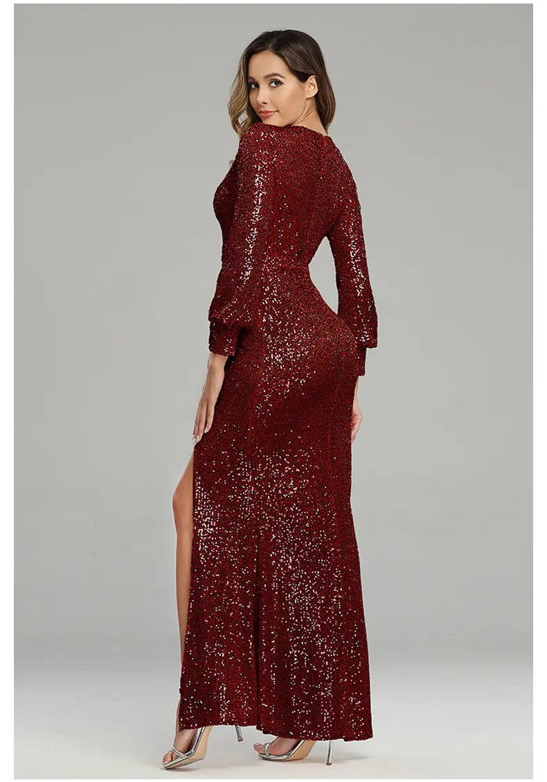 A shimmering burgundy sequined evening dress with long sleeves and a sexy high slit from the fantasy celebrity sexy collection.