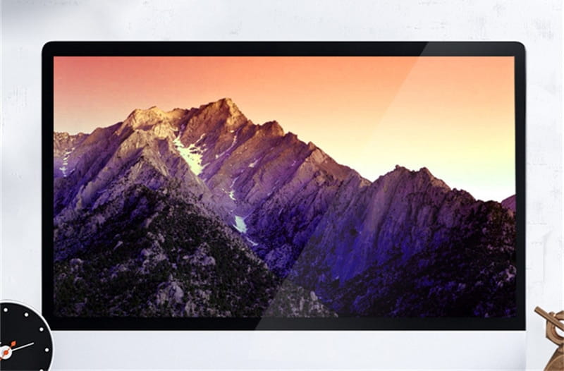 black-framed monitor displaying a vibrant mountain landscape wallpaper with warm orange and purple hues alongside a bluetooth dual-mode soundbar with blue led strip showcasing a bluetooth dual-mode upgrade and color classification feature