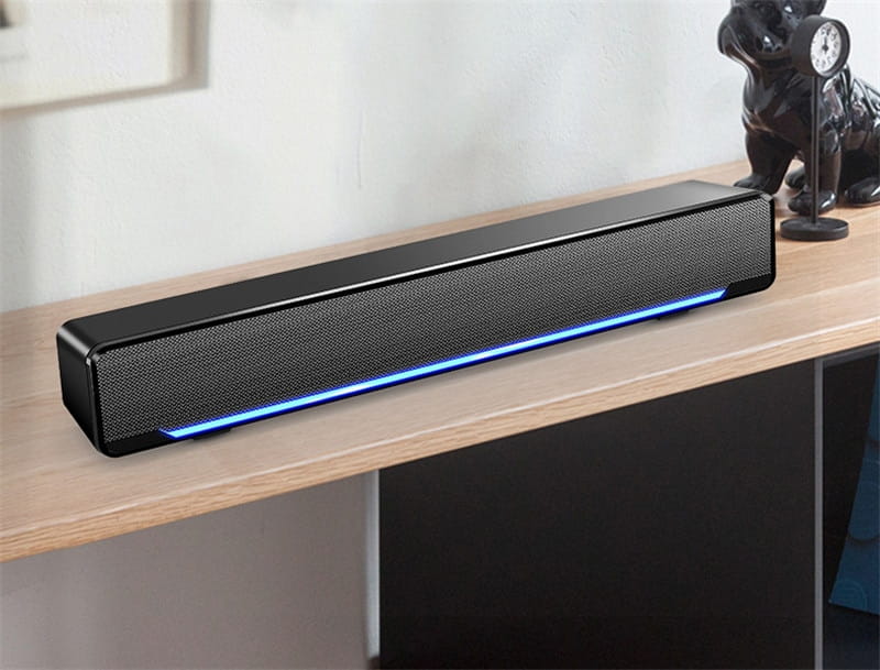 black rectangular bluetooth dual-mode soundbar with textured grille and glowing blue led strip along the bottom edge featuring a bluetooth dual-mode upgrade and color classification