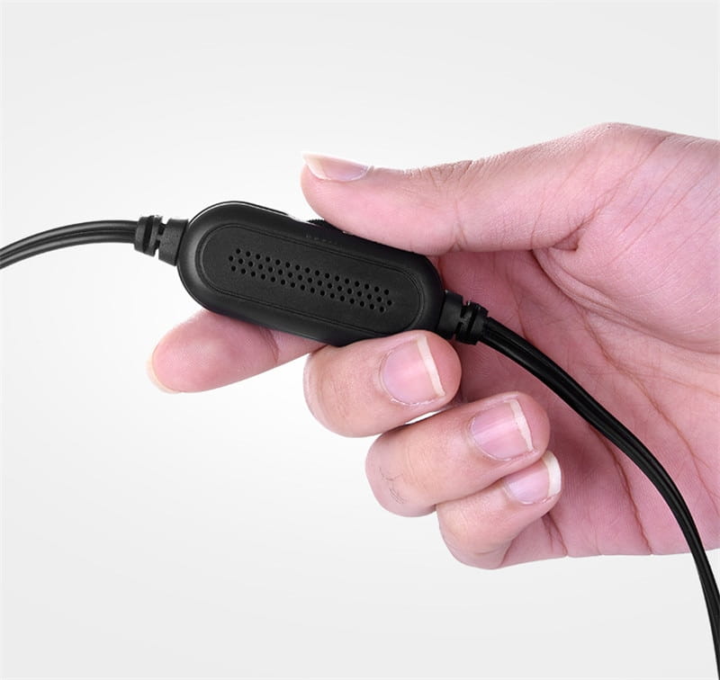 black plastic audio adapter with perforated grille and two connected cables shown at the back side of the bluetooth dual-mode soundbar with blue led strip featuring bluetooth dual-mode upgrade and color classification.