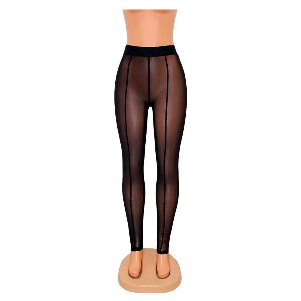 Black high waisted skinny mesh see-through leggings with a solid black waistband and vertical seam detailing.