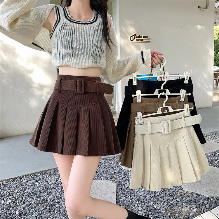 brown belted corduroy half skirt pleated mini featuring a matching belt and detailed fabric texture