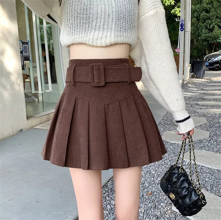 brown pleated corduroy half skirt with matching belt featuring a skirt pleated design in a mini length
