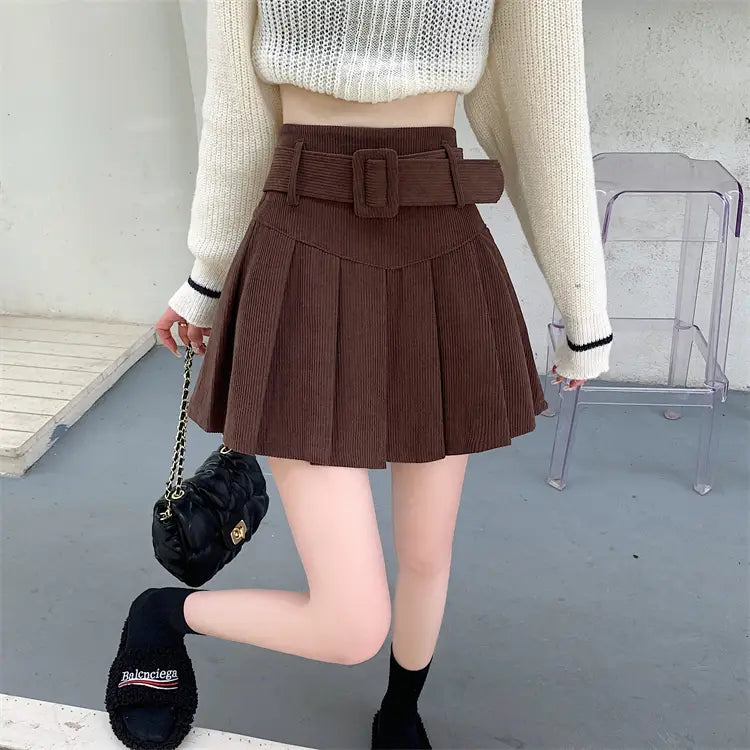 brown corduroy half skirt pleated mini with a matching belt featuring a rectangular buckle for a stylish skirt pleated look
