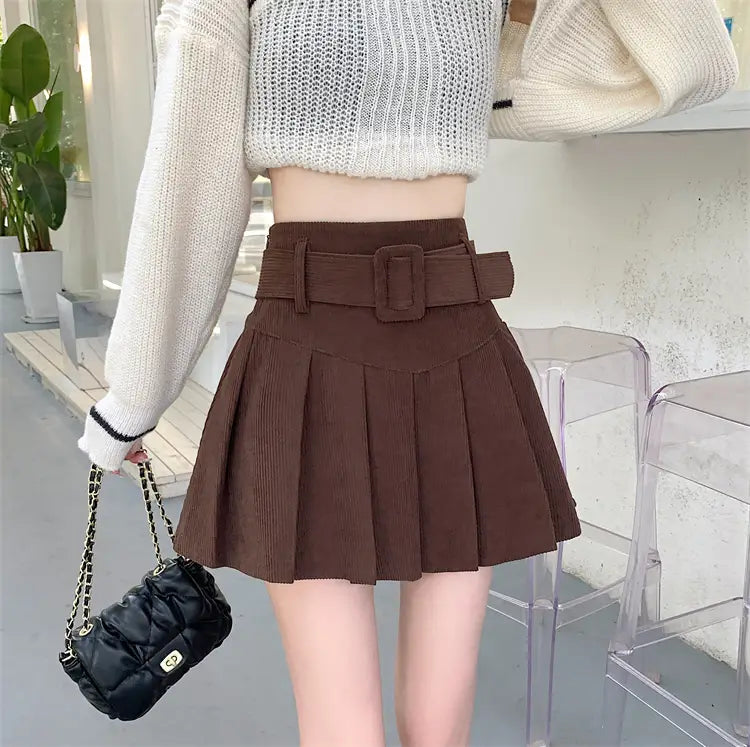 brown belted corduroy half skirt pleated mini with a matching belt featuring a rectangular buckle