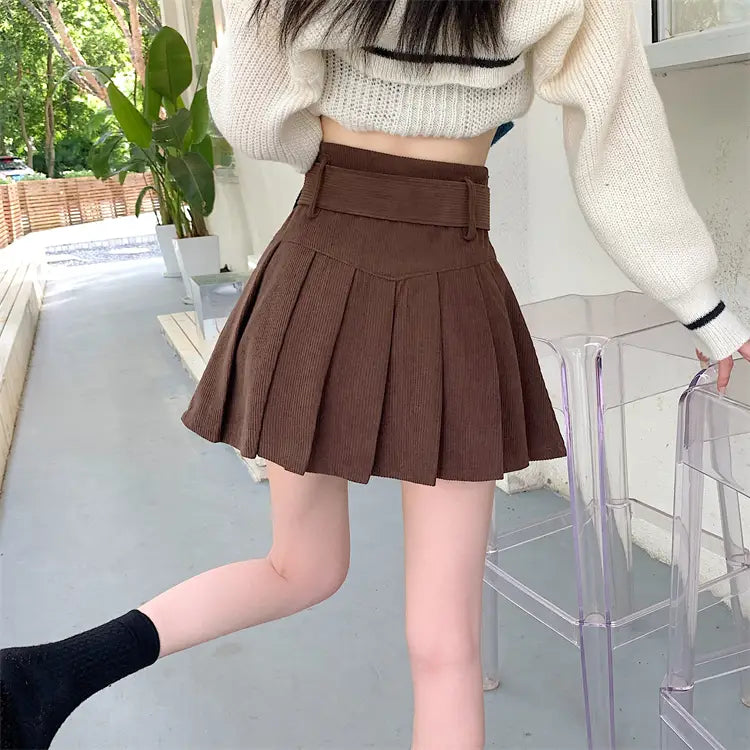 brown corduroy half skirt pleated mini with matching belt and belt loops.