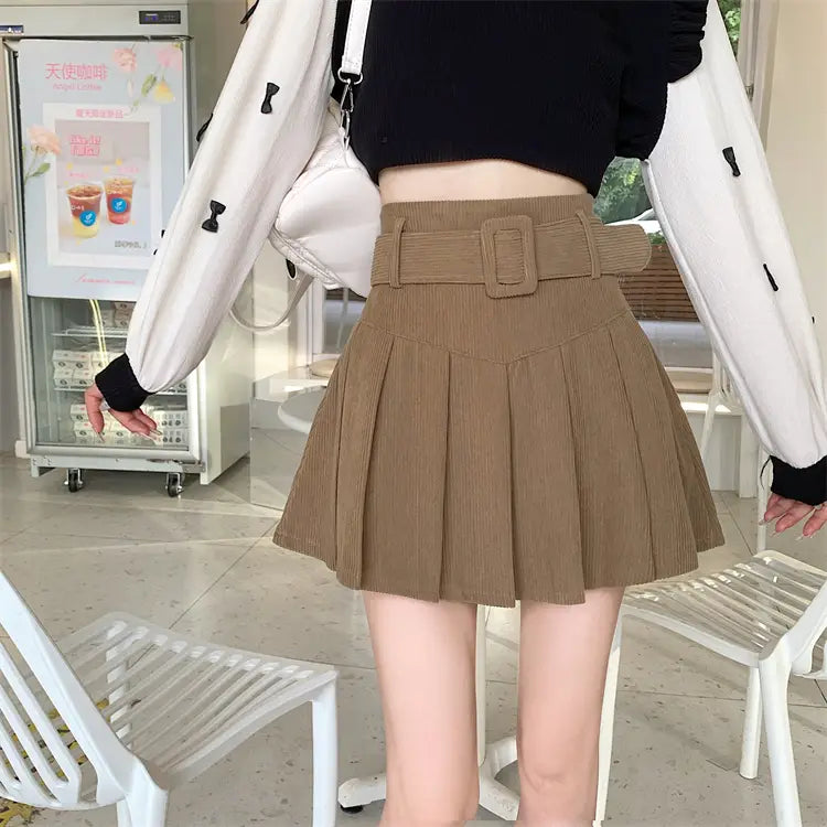 brown belted corduroy half skirt pleated mini featuring a brown corduroy pleated skirt with a matching belt and rectangular buckle