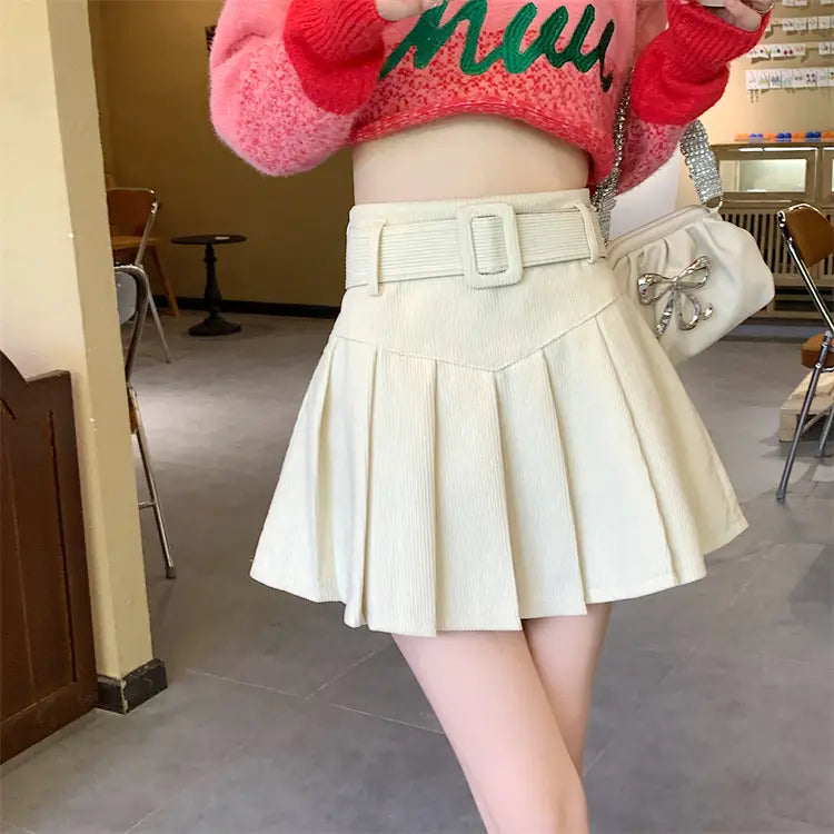 cream-colored corduroy half skirt pleated mini with a matching brown belted corduroy half skirt pleated design and ribbed texture