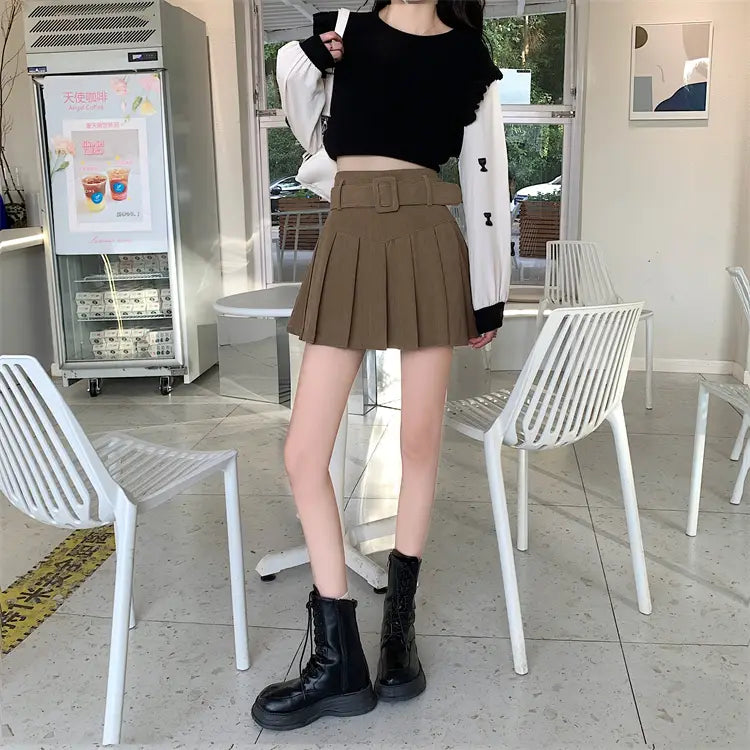 brown corduroy half skirt pleated mini with matching belt and buckle showcases a stylish skirt pleated skirt design