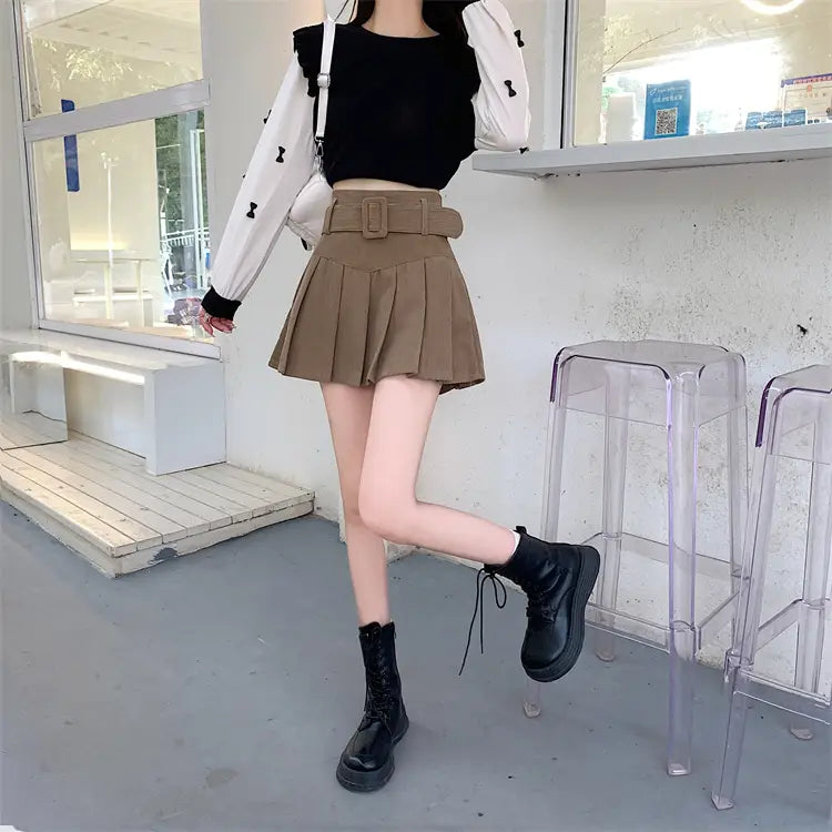 brown belted corduroy half skirt pleated mini featuring a matching belt and buckle in a skirt pleated design