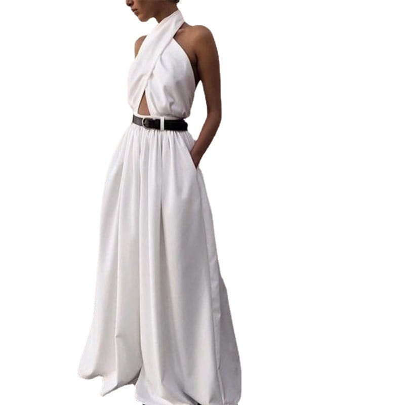 white sexy sleeveless halter backless jumpsuit featuring a white halter-neck maxi dress with a draped neckline and side cutout, cinched at the waist by a black belt.