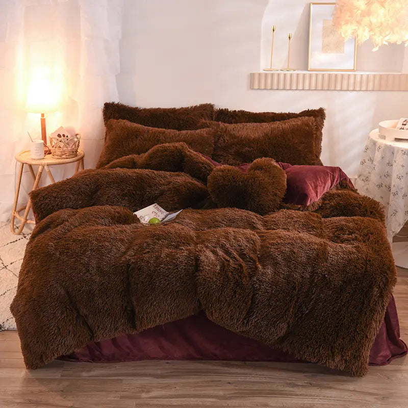 brown faux fur plush duvet cover set with matching pillows and heart-shaped accent pillow featuring a soft quilt cover texture for cozy bedding.