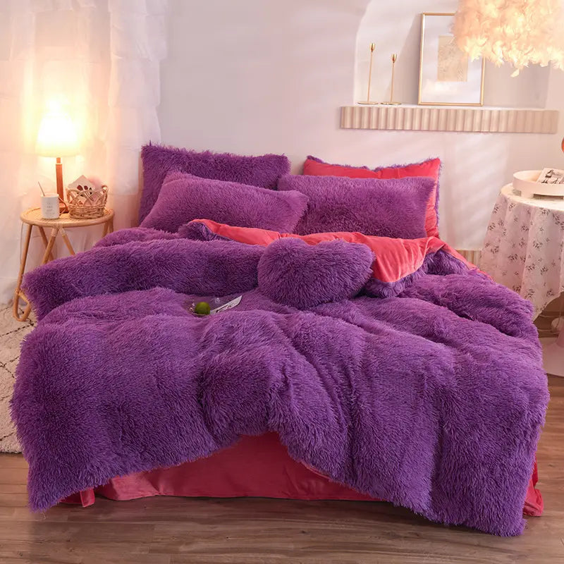 Pink fluffy faux fur plush duvet cover set featuring a purple fluffy duvet cover with shaggy texture and coral-colored pillowcases for a luxurious bed sheet and quilt cover experience.