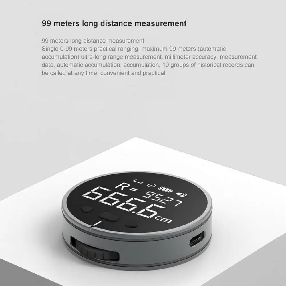 gray circular electronic measuring ruler with a black digital lcd display showing 666.0cm and technical specifications text above it.