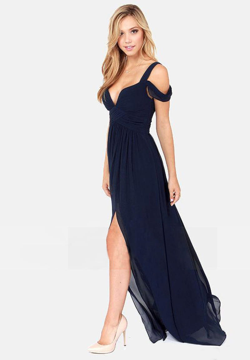 A navy blue chiffon floor length elegant greek style maxi dress with off the shoulder straps and a high slit.