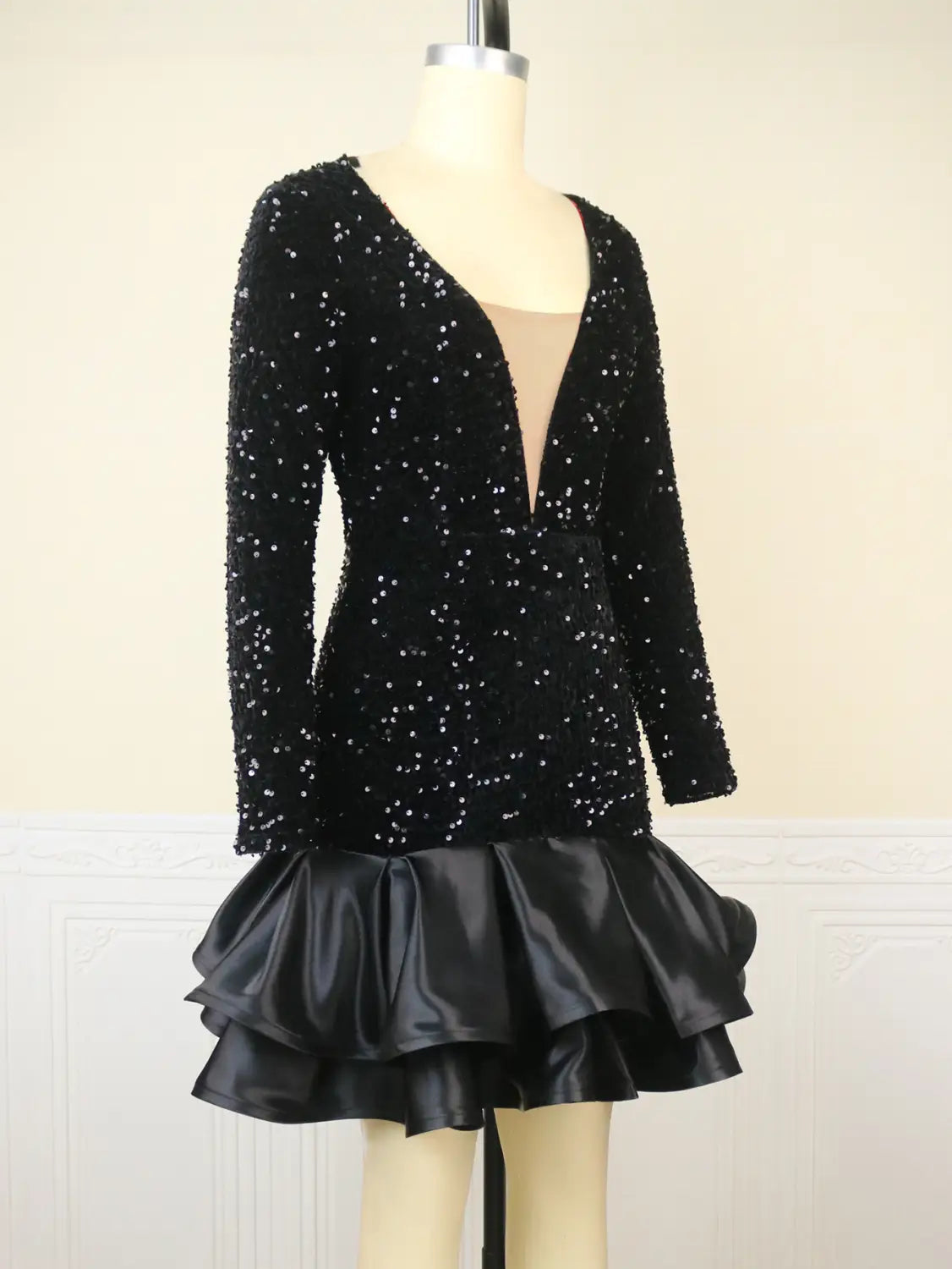 Black sequined long-sleeve v neck dress with a ruffled satin skirt designed for a banquet ball party.