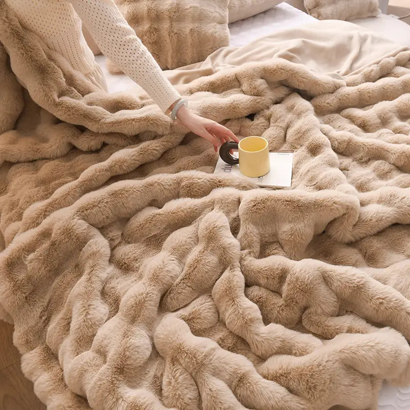 beige rabbit velvet blanket thickened faux fur throw with a plush, textured surface and soft, wavy folds featuring a velvet blanket design