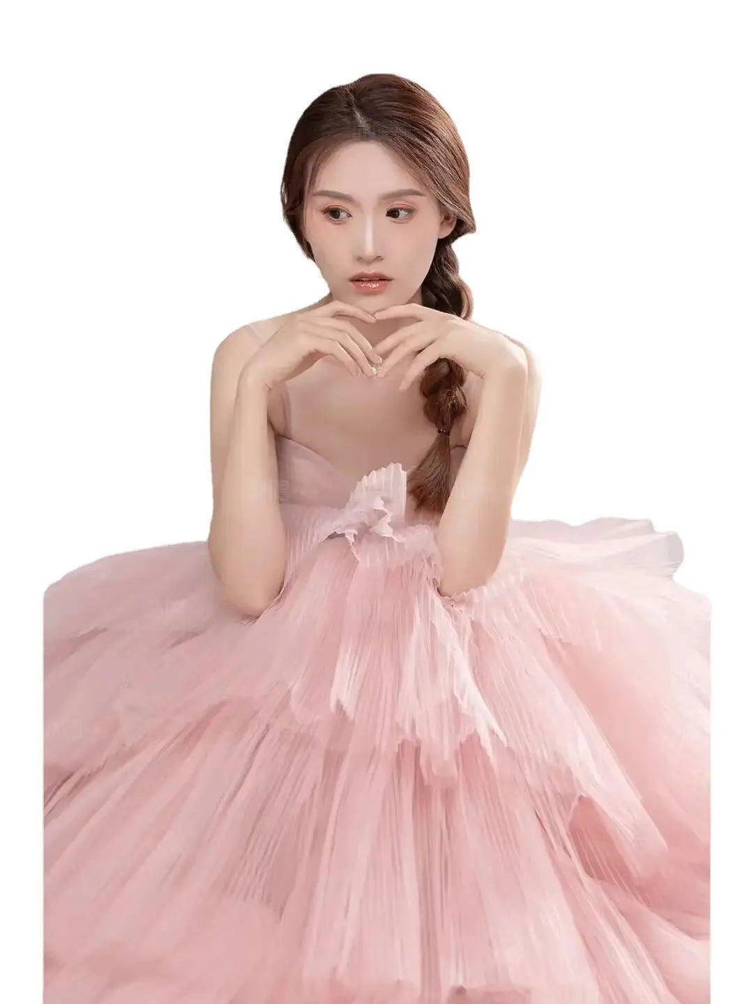 A soft pink multi-layered tulle wedding photography dress with a delicate floral embellishment at the waist ideal as a photography dress pink or dress pink white.