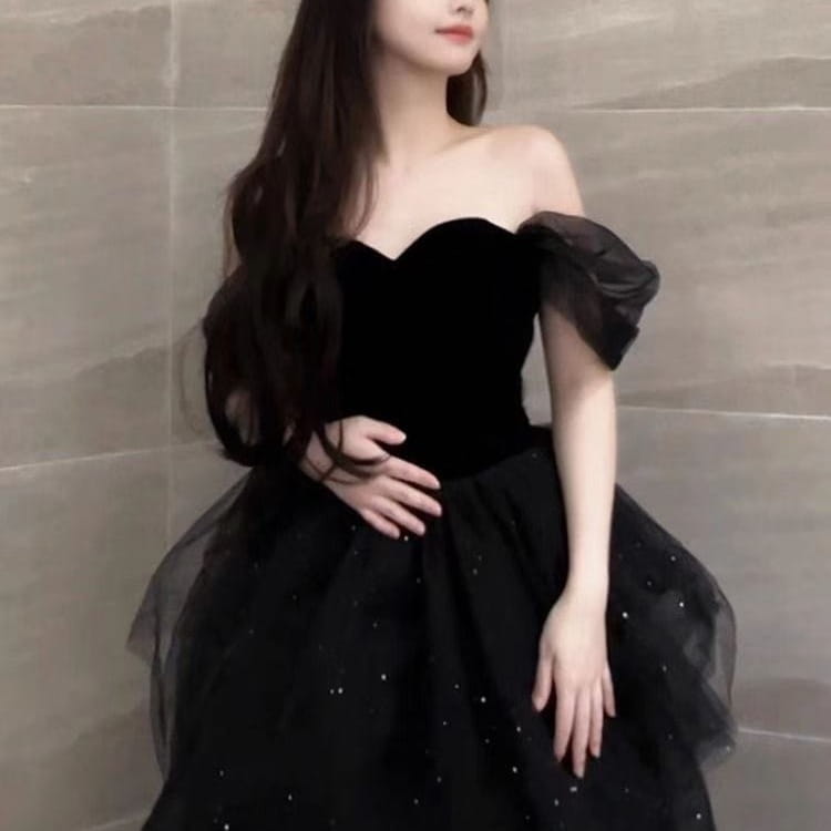 black velvet and tulle light luxury evening dress featuring an off-the-shoulder design with sheer puffed sleeves and a sparkling sequin-adorned skirt ideal as a black evening dress or evening dress light luxury option.