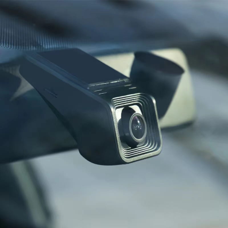 Black rectangular driving recorder with square lens housing featuring concentric silver rings designed for 1080p HD night vision driving.