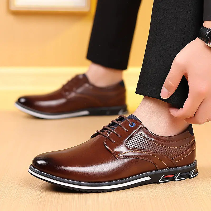 Brown textured work fashion leather shoes featuring brown leather lace-up dress shoes with a textured panel and black rubber sole with white stitching.