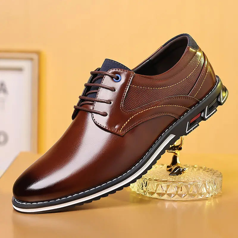 Brown textured work fashion leather shoes featuring brown leather lace-up dress shoes with a glossy finish and contrasting black sole.